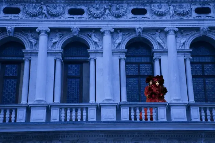 Framed Print : Europe, Italy, Venice. Composite of couple on balcony in Carnival costumes. Credit as