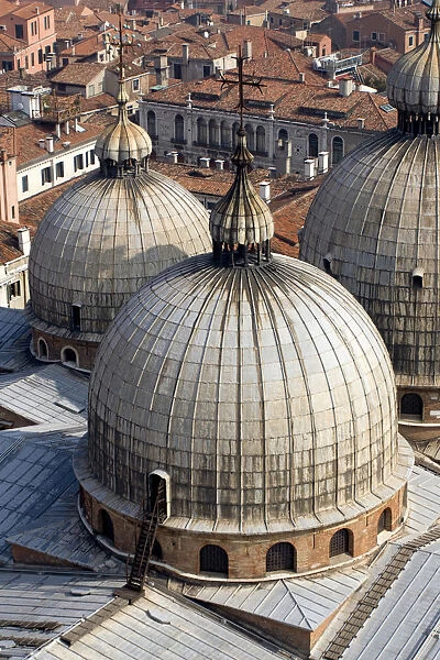 Europe, Italy, Venice. Looking down on the domes of St. Marks Basilica from the Campanile