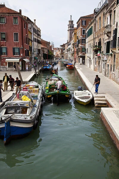 Europe; Italy; Venice; Merchants Delivering Goods Along Side Canals of Venice