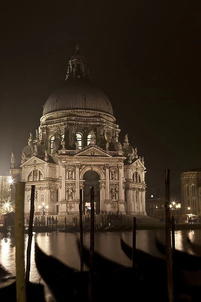 Europe, Italy, Venice. Night view across water of the San Giorgio Maggiore church