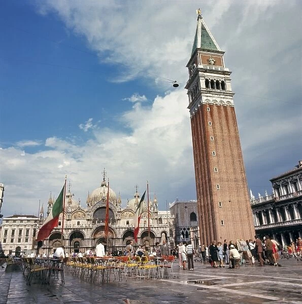 Europe, Italy, Venice. Visitors fill Piazza San Marco near the Campanile and the