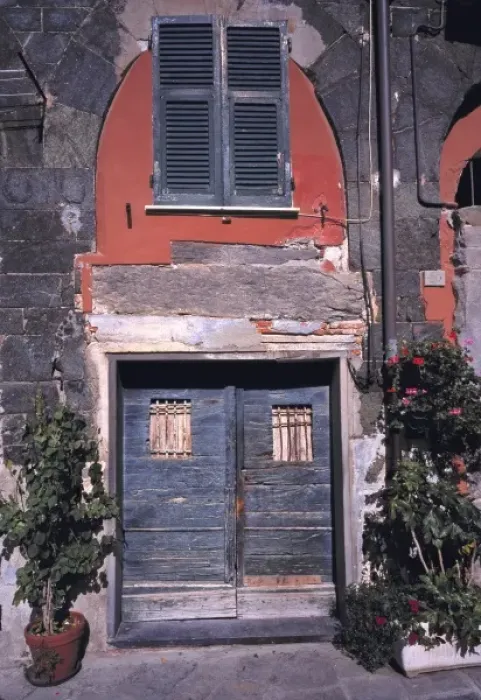 Framed Print : Europe, Italy, Vernazza. Blue wooden doors are accented by the red walls and ancient