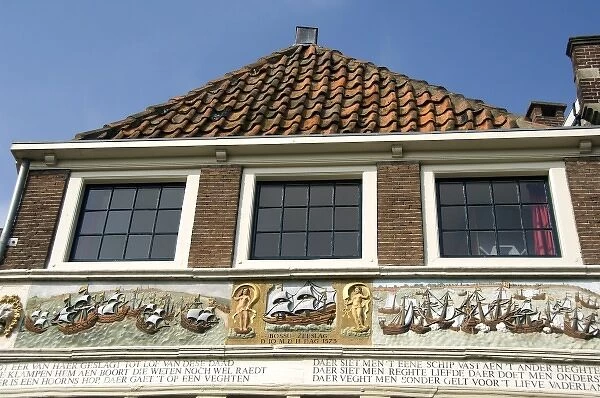 Europe, The Netherlands (aka Holland), Hoorn. Historic shipping building facade