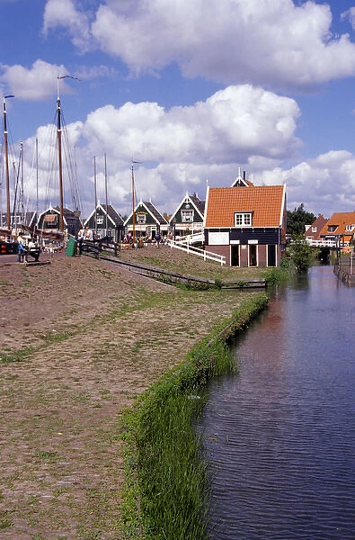 Europe, Netherlands, Amsterdam, Marken. Typical town buildings and canal, charming