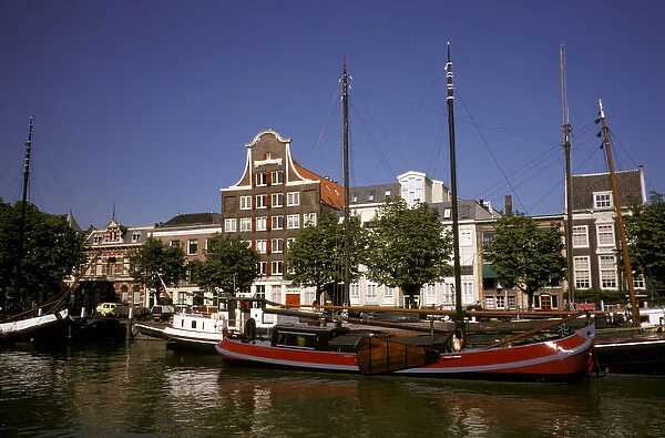 Europe, Netherlands, Dordrecht. Boats lining canal