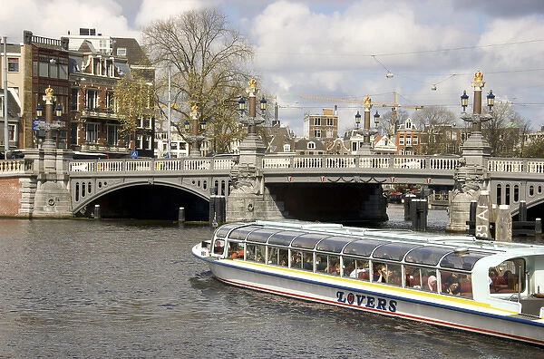 Europe, Netherlands, South Holland, Amsterdam, River Amstel tourist in river boat