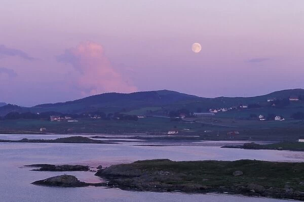 Europe, Norway, Hildefjord. Full moon rises above farmland north of Stavanger