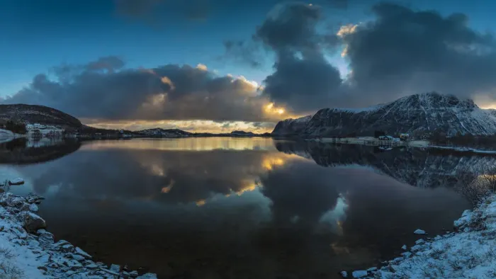Framed Print : Europe, Norway. Snow covered mountains surround the still waters of Stullbruvaknet near Framed Print : Europe, Norway. Snow covered mountains surround the still waters of Stullbruvaknet near