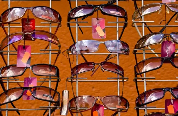 Framed Print : Europe, Poland, Gdansk. Sunglasses on display in shop on River Motlawa waterfront