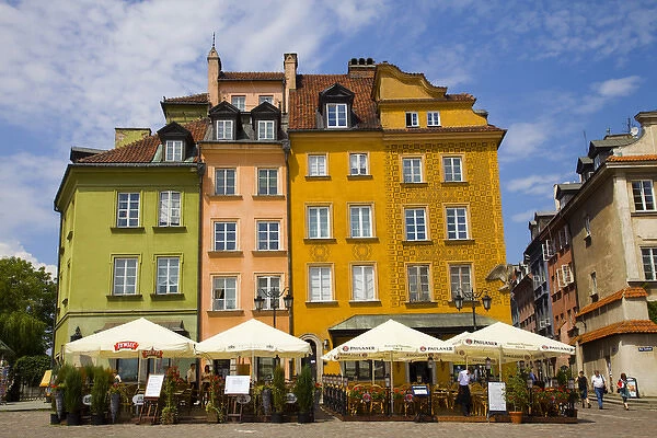 Europe, Poland, Warsaw. Buildings and outdoor dining in plaza