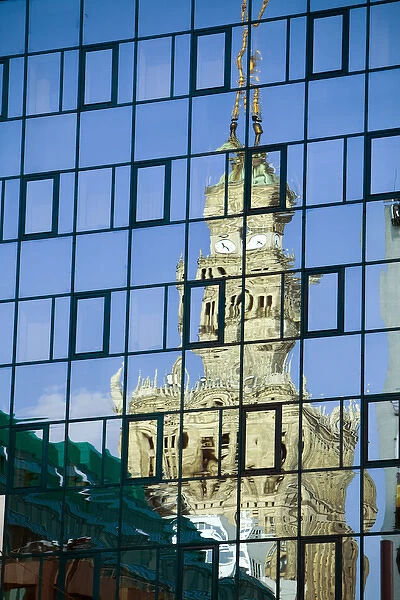 Europe, Poland, Warsaw. Old building reflects in new building