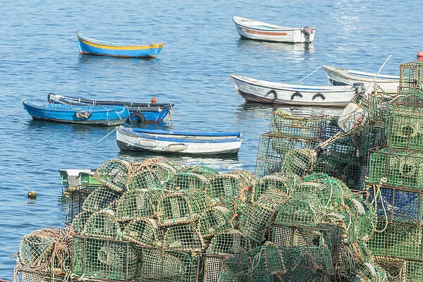 Europe, Portugal, Cascais, lobster traps and fishing boats