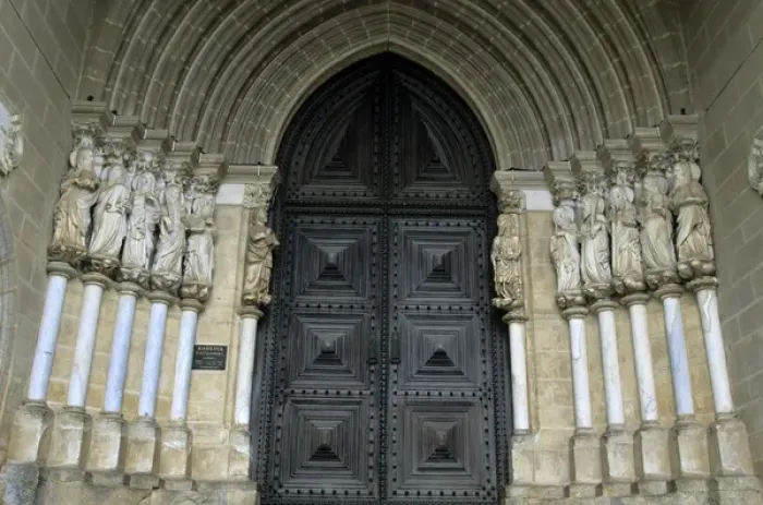 Framed Print : Europe, Portugal, Evora. Carved figures of the Apostles adorn the gothic entrance
