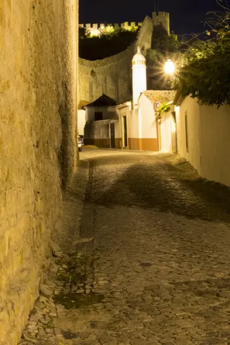 Framed Print : Europe, Portugal, Obidos. Leira District. Narrow alleyways and streets, Cobblestone walkways