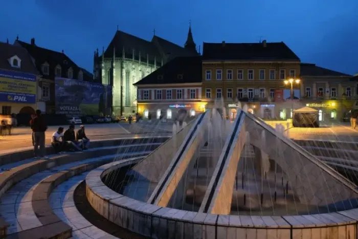 Framed Print : Europe, Romania, Brasov, The night view of fountain on the Sfatului square with