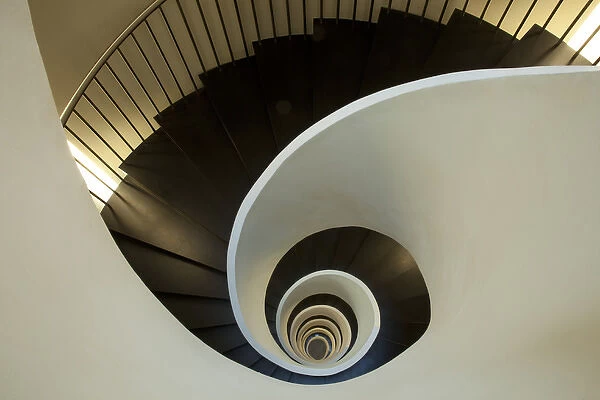 Europe Spain, Bilbao. Spiral staircase in the Silken Gran Hotel Domine. Credit as