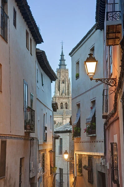Europe, Spain, Toledo, Alleyway and Toledo Cathedral Steeple