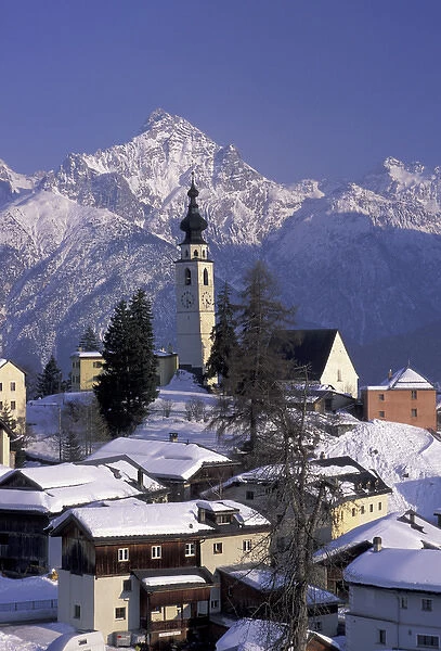 Europe, Switzerland, Graubunden, Ftan Village. Winter afternoon in town with Unterengradin