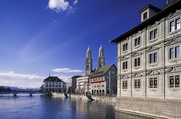 Europe, Switzerland, Zurich. Grossmunster Cathedral and Limmat River in daytime