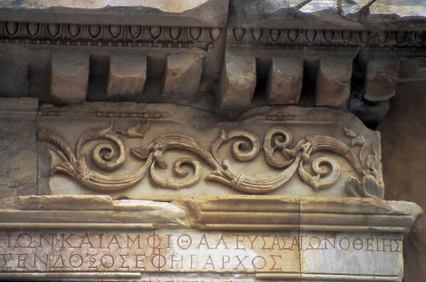 Europe, Turkey, Ephesus. Roman decorative carvings in marble on a ruin, using Greek classical motif
