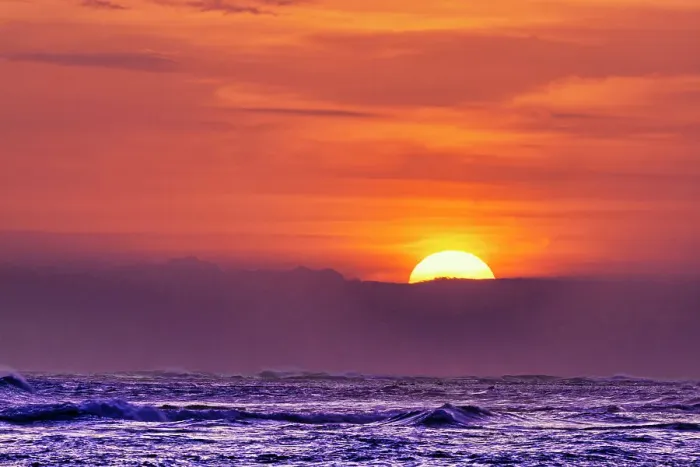 Framed Print : Each evening the incredible colors of the setting sun becomes a tourist mecca on the beaches of Bali, Indonesia Framed Print : Each evening the incredible colors of the setting sun becomes a tourist mecca on the beaches of Bali, Indonesia