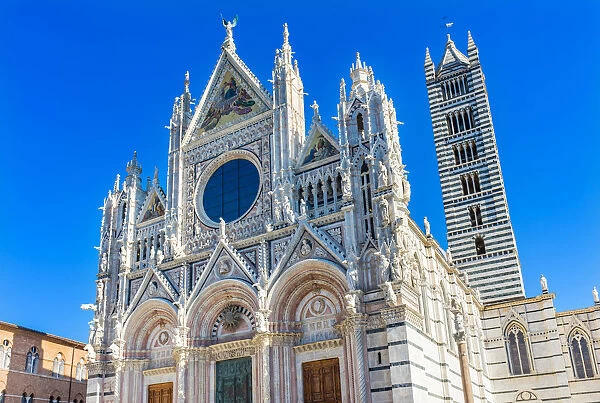 Facade of Towers Mosaics Cathedral, Siena, Italy. Cathedral completed from 1215 to 1263