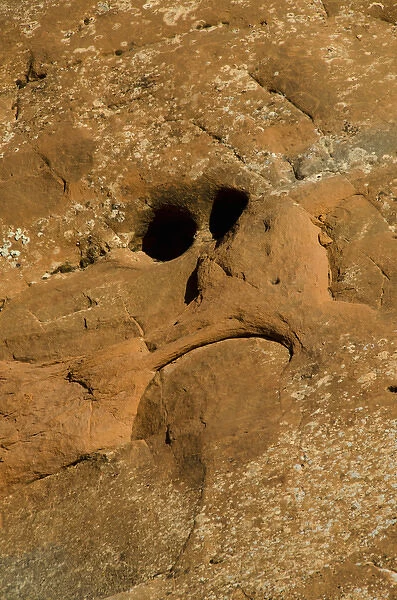 Face in Sandstone near Tunnel Arch, Arches National Park, Utah, US