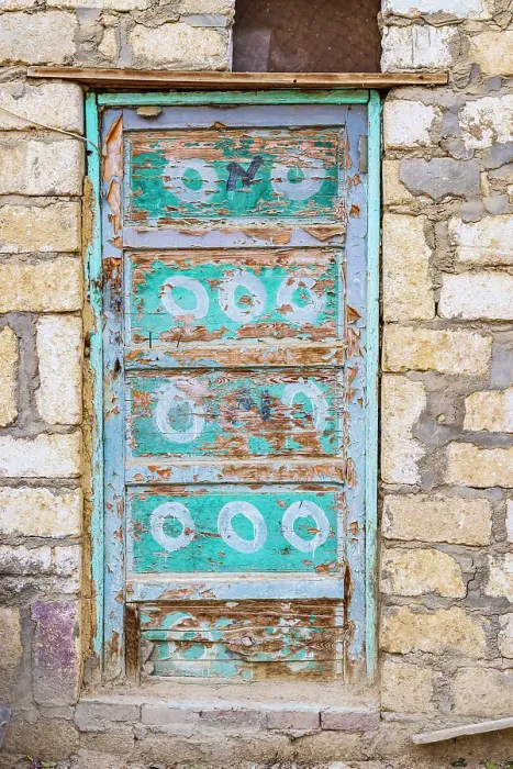Framed Print : Faiyum, Egypt. A blue painted door on a building Framed Print : Faiyum, Egypt. A blue painted door on a building