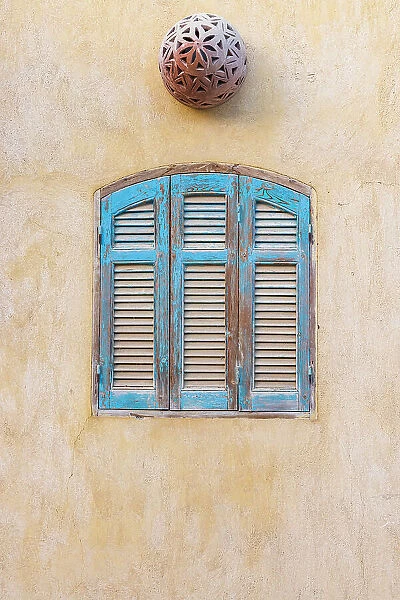 Faiyum, Egypt. Blue wooden shutters