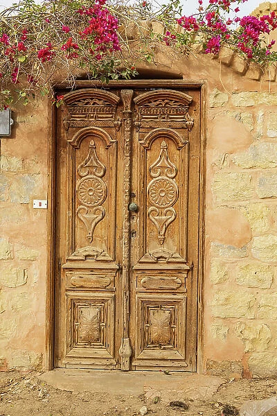 Faiyum, Egypt. Wooden door in a wall