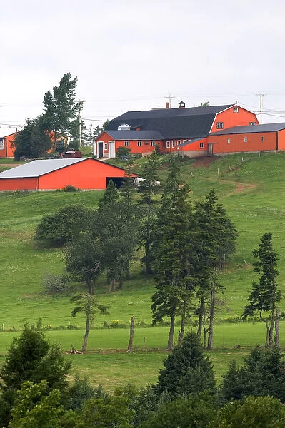 Farm and red barn on a hill at New Glasgow, Prince Edward Island, Canada