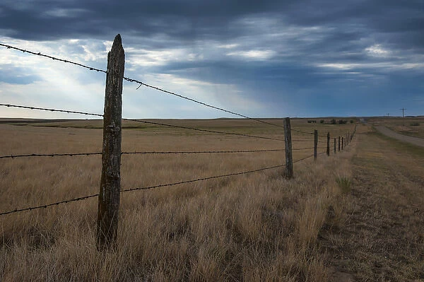 Fence in the Savanah near the Minuteman nuclear missile site, South Dakota, USA