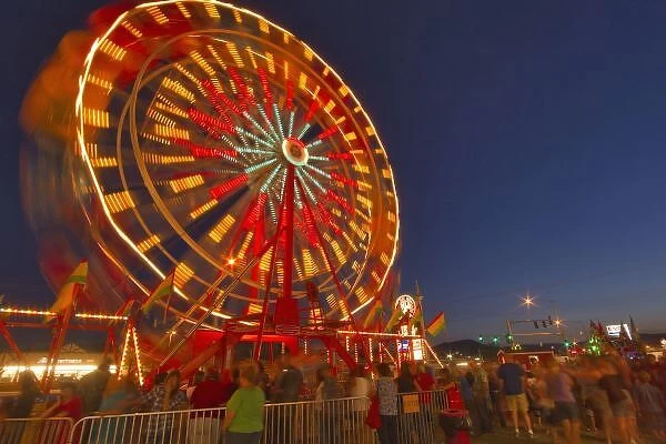 Ferris wheel at dusk at the Northwest Montana Fair in Kalispell, Montana, USA