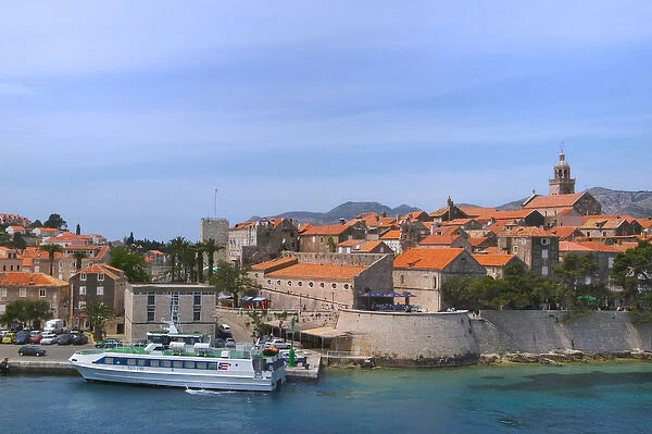 Ferry boat with cityscape of Korcula in Adriatic Sea, Croatia