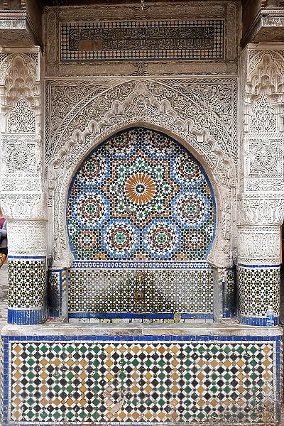 Fes, Morocco. One of the 300 tiles fountains in the medina. Most are located next to a mosque