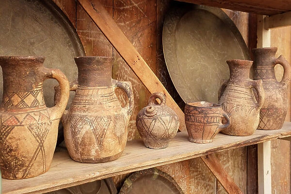 Fes, Morocco. Antique clay jugs on a shelf