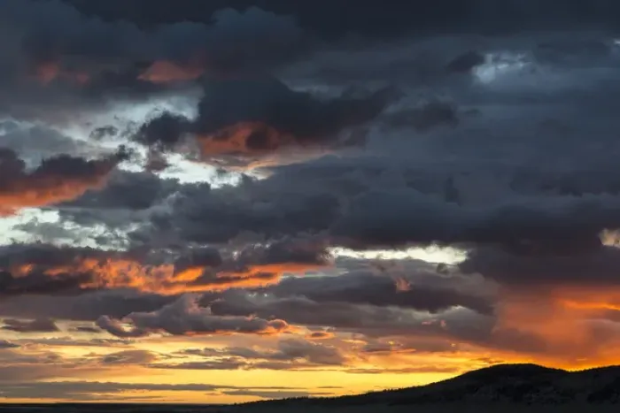 Framed Print : Fiery sunrise light over Pine Butte along the Rocky Mountain Front near Choteau, Montana