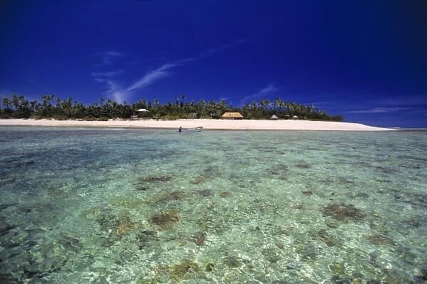 Fiji Islands, Tavarua. The simple resort at Tavarua is upstaged by the aquamarine waters