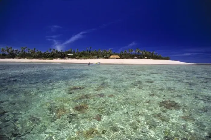 Framed Print : Fiji Islands, Tavarua. The simple resort at Tavarua is upstaged by the aquamarine waters