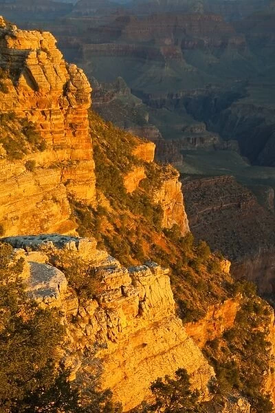 First light of the day hits walls at Mather Point along the South Rim of Grand Canyon