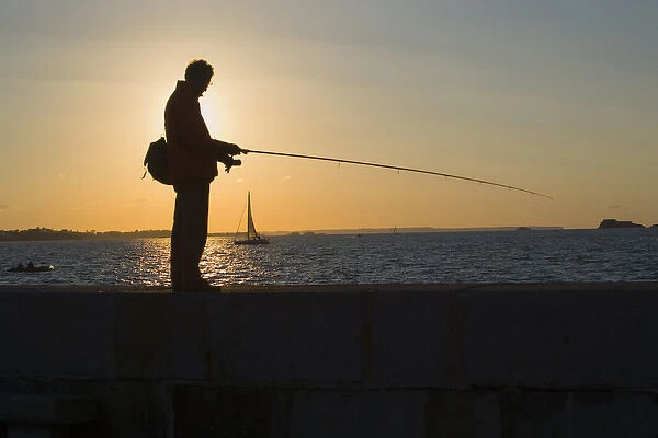 Fisherman on jetty, Saint Malo, Ille et Vilaine, Brittany, France