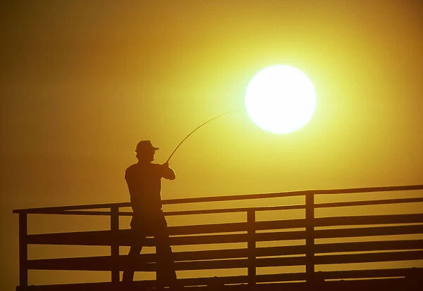 Fisherman on pier, Shilshole Marina, Seattle, Washington State, USA