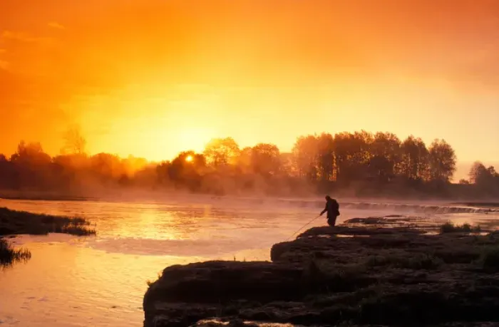 Framed Print : Fisherman at sunrise on Venta River waterfall at city of Kuldiga in Kurzeme region Framed Print : Fisherman at sunrise on Venta River waterfall at city of Kuldiga in Kurzeme region