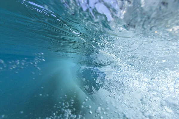 Fisheye view of wave breaks at Kua Beach, North of Kona, Big Island, Hawaii