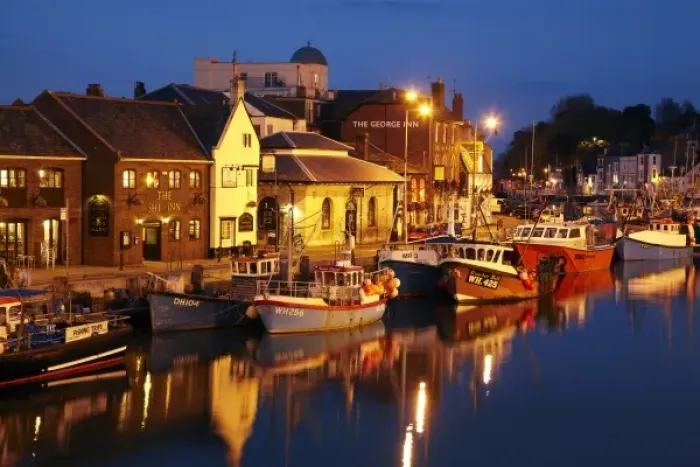 Framed Print : Fishing boats and Custom House Quay at dusk, Weymouth Harbour, Weymouth, Dorset, England