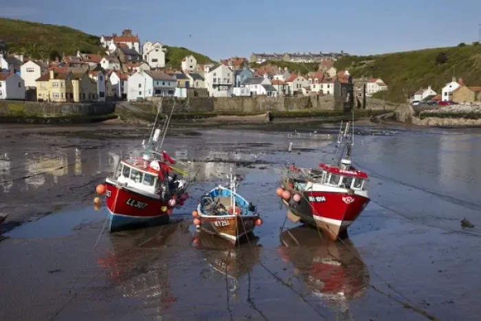 Framed Print : Fishing boats at low tide, Staithes, North Yorkshire, England Framed Print : Fishing boats at low tide, Staithes, North Yorkshire, England