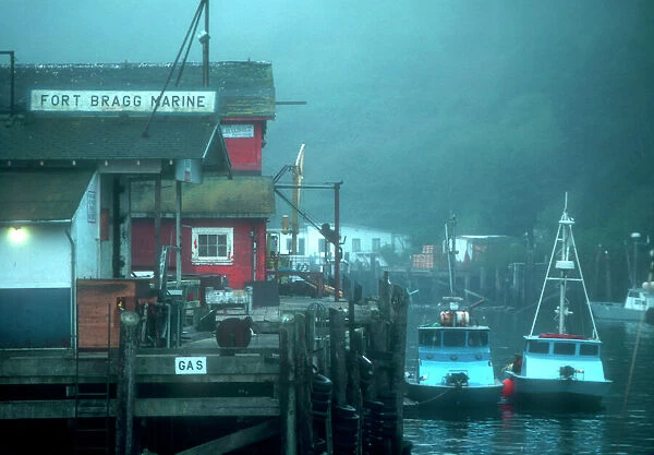 Two fishing boats tied up to pier at Noyo harbor, near Fort Bragg, California