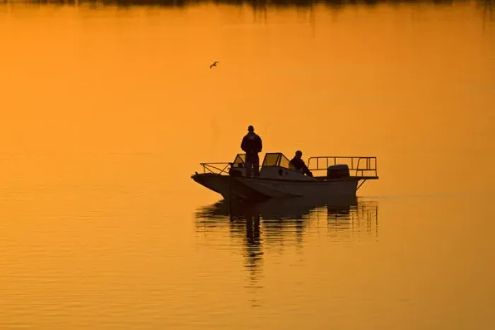 Framed Print : Fishing at sunset in north Texas, winter on Lake Arrowhead, USA Framed Print : Fishing at sunset in north Texas, winter on Lake Arrowhead, USA