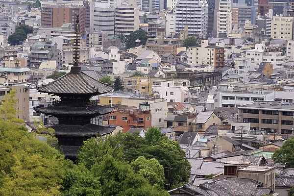 The five-tiered pagoda of To-ji, the tallest in Japan, looks out over the modern city of Kyoto