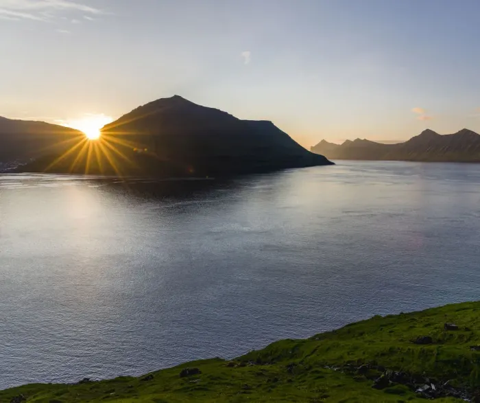 Framed Print : Fjord Fuglafjordur and Leirviksfjordur at sunset, in the background the mountains Framed Print : Fjord Fuglafjordur and Leirviksfjordur at sunset, in the background the mountains